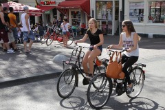 Teenagers cycling in Amsterdam